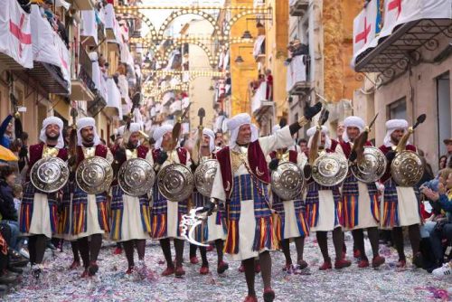 Alcoy, Spain - April 22, 2016: People dressed as Christian legion marching in annual Moros y Cristianos parade in Alcoy, Spain on April 22, 2016